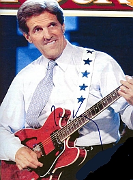 Secretary of State John Kerry playing guitar